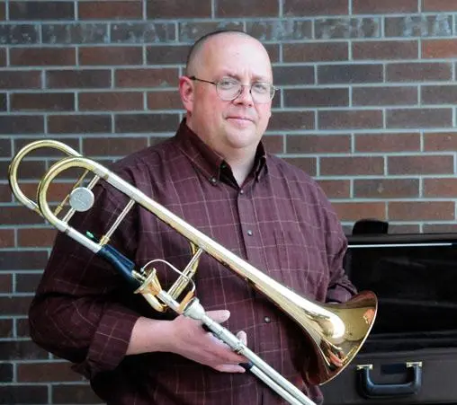 Leonard Neidhold with his trombone